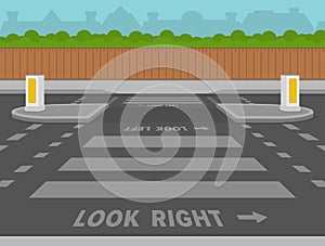 Zebra crossings with a central island. Look right, look left sign for pedestrian. Left-hand traffic street view.