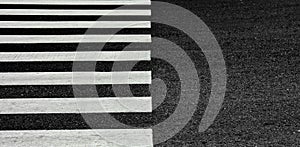 Zebra crosswalk on a asphalt road.