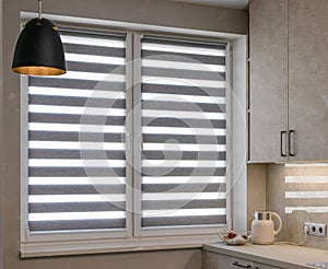 Zebra roller blinds in kitchen interior