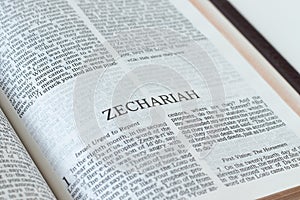 Zechariah open Holy Bible Book close-up