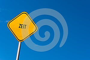 Zeit - yellow sign with blue sky