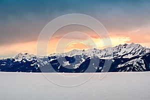 Zell am See in winter. View from Schmittenhohe, snowy slope of ski resort in the Alps mountains, Austria. Stunning