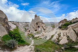 The Zelve Open Air Museum in Cappadocia, Turkey, has many sharp limestone mountains in the summer