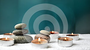 Zen concept, spa pebbles stones and burning aroma candles smoke, Treatment aromatherapy and massage copy space