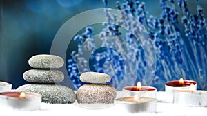 Zen concept, spa pebbles stones and burning aroma candles, Treatment aromatherapy and massage copy space