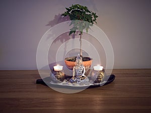 Zen garden with candles and Maple bonsai