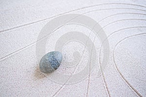 Zen Garden Japanese pattern on white sand background