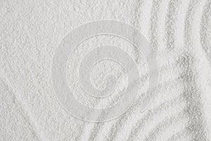 Zen garden with line pattern on white sand in Japanese style, Sand texture surface with wave parallel lines pattern,Background