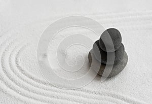 Zen Garden with Stack stone on white Sand line pattern in Japanese stye, Rock Sea Stone on Sand texture with the wave parallel