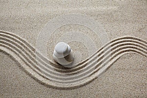 Zen garden, stone on sand. Top view