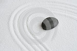 Zen Graden with Grey Stone on White Sand Line Texture Background, Top View Black Rock Sea Stone on Sand Wave Parallel Lines
