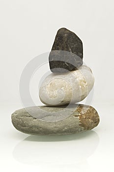 zen like stone pile on white background