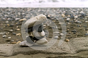 Zen stone pyramid on rock