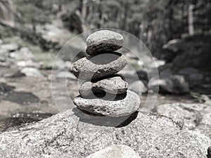 Zen meditation background, balanced piles stacked in black and white water