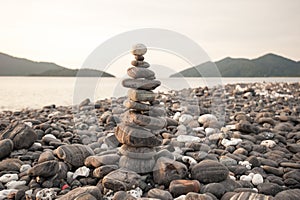 Zen meditation background,Balanced stones stack close up on sea