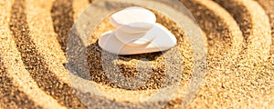 zen meditation stone in sand, concept for purity harmony and spirituality, spa wellness and yoga background