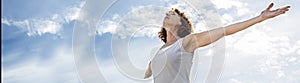 Zen middle aged yoga woman opening up her chakra, banner photo