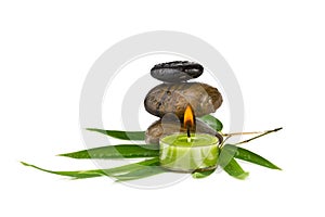 Zen pebbles with bamboo leaves and candle, i