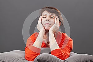 Zen relaxation for tired 50s gorgeous woman photo