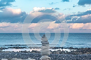 Zen Rocks on a Beach at Sunset