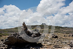 Zen rocks outdoors with mountains on background