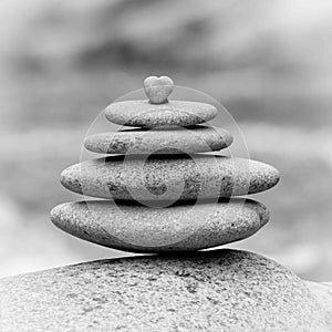 Zen rocks stacked and topped with a heart