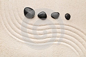 Zen sand and stone garden with raked curved lines. Simplicity, c