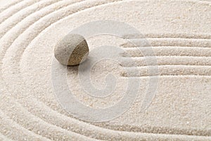 Zen sand and stone garden with raked lines and curves. Simplicity, concentration or calmness abstract concept