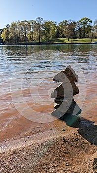 Zen stacked stones in a lake shore