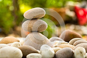 Zen stacked stones on nature background