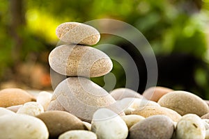 Zen stacked stones on nature background