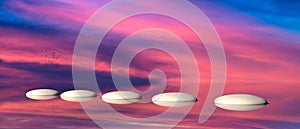 Zen stepping stones on water, sky on sunset background. 3d illustration