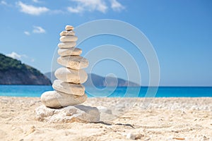 Zen stone balancing on a beach in Greece