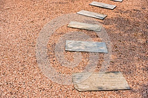 Zen stone path on gravel floor in the garden