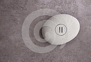 Zen stone pause symbol