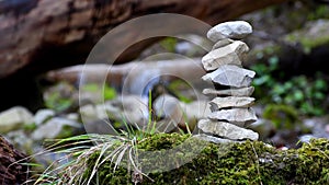 Zen stone pyramid with small water cascade