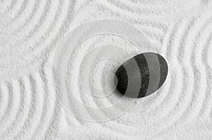 Zen Stone with White Sand Texture Background, Top View Zen Garden with Black Rock Sea Stone on Sand Wave Parallel Lines Pattern