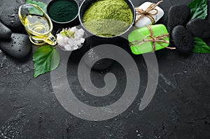 Zen stones and leaves with water drops.