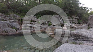 Zen stones in quiet river lake