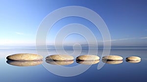 Zen stones row from large to small in water