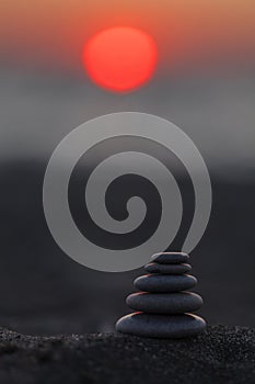 Zen stones at sunset