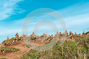 Zen style Pyramid shape of stones at Phrom Thep Cape, Landmark in phuket Thailand, This cape is a popular sunset viewing point