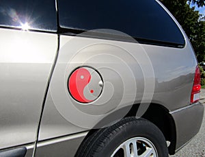 Zen symbol. Yin and Yang sign on vehicle`s fuel cap.