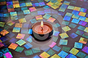 `Zen Times Ten` votive candle in water with glass tiles