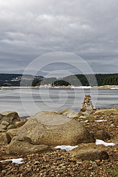 Zen yellow stones near lake