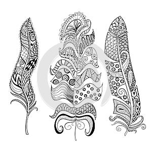 Zentangle stylized elegant feathers set. Hand drawn vintage photo
