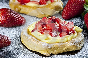 Zeppole with strawberry- tipical italian pastry