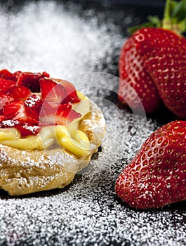 Zeppole with strawberry- tipical italian pastry