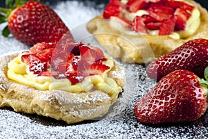 Zeppole with strawberry- tipical italian pastry