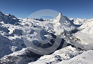 Zermatt Matterhorn and glacier monte rosa sunset view mountain winter snow landscape Swiss Alps clouds panorama